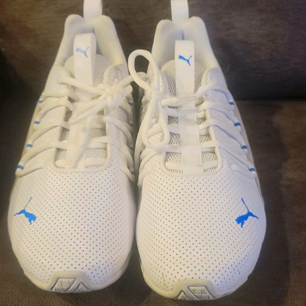 White and light blue Puma